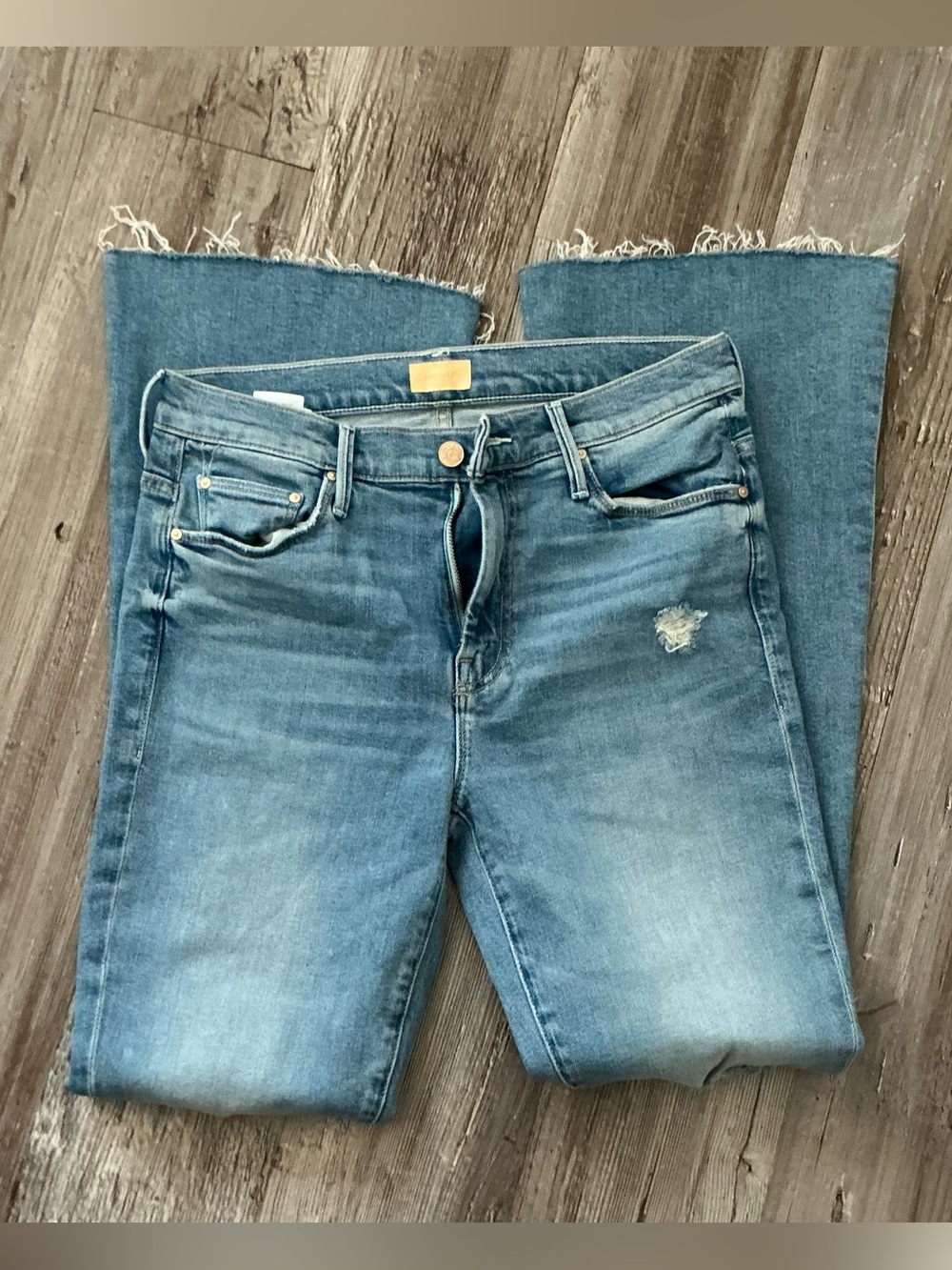 MOTHER Blue Distressed Flare Jeans with Raw Hem